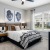 Carpeted Bedroom with Ceiling Fan and Ample Natural Lighting